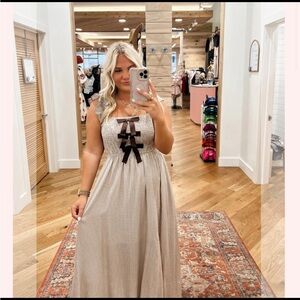Elegant Checkered Maxi Dress with Bow Accents